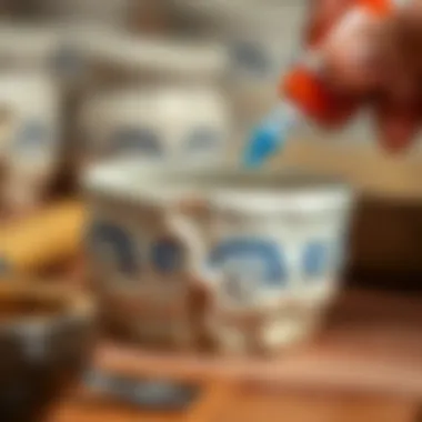 Detailed view of a ceramic piece being joined with adhesive